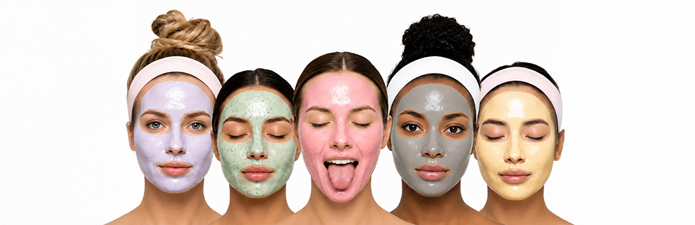 Models wearing colorful skincare masks used in facial treatment education